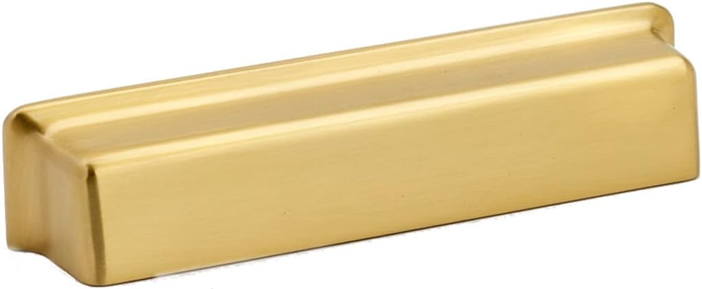 Alno satin brass drawer pull installed on a modern kitchen cabinet